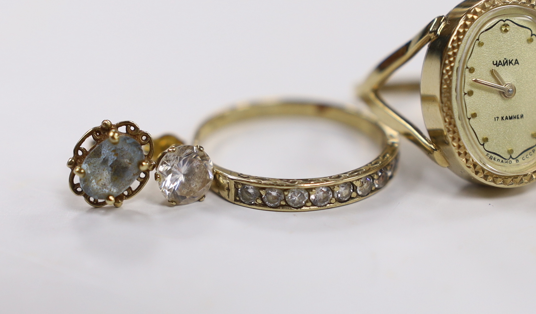 A modern 9ct and CZ set cluster ring, two other rings including watch ring and two pairs of 9ct ear studs.